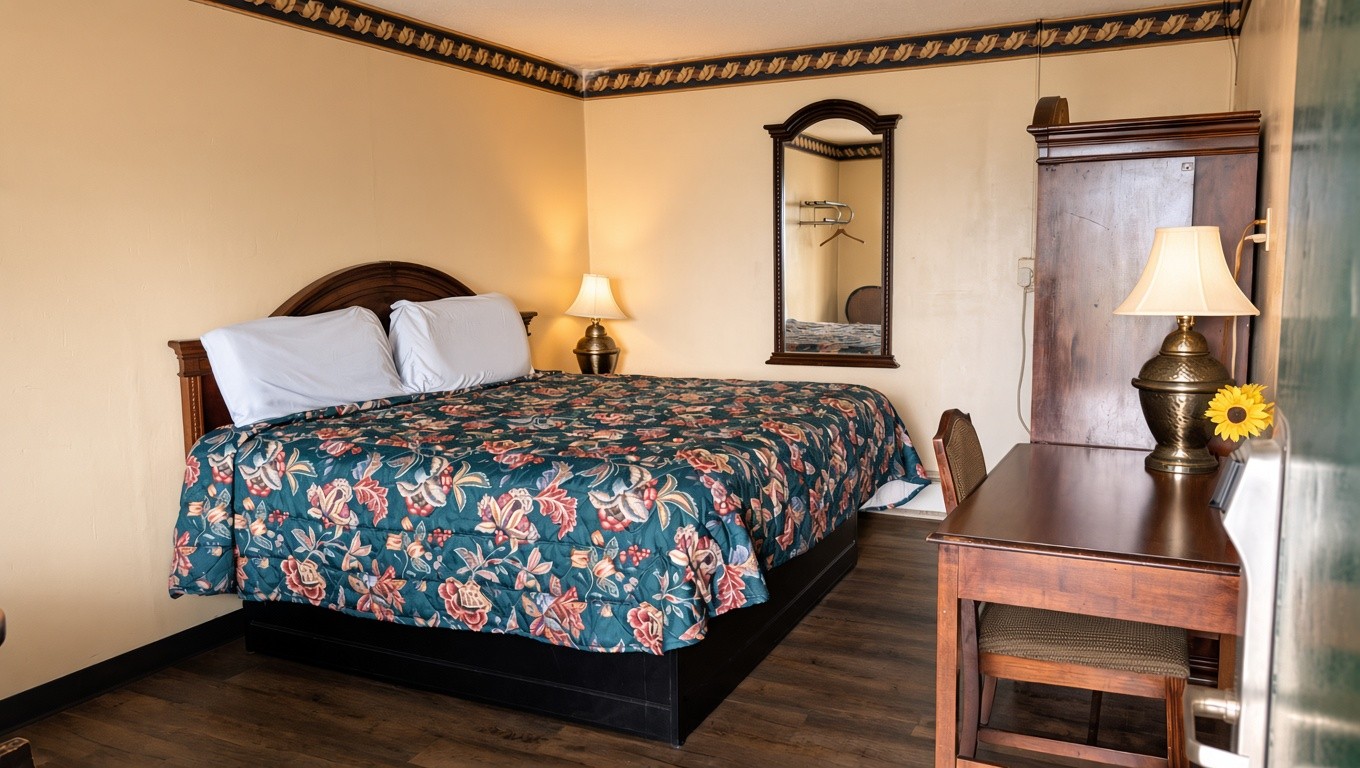 King Size Bed room at Delta Motel Bay City MI